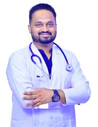 Dr Harsha C M